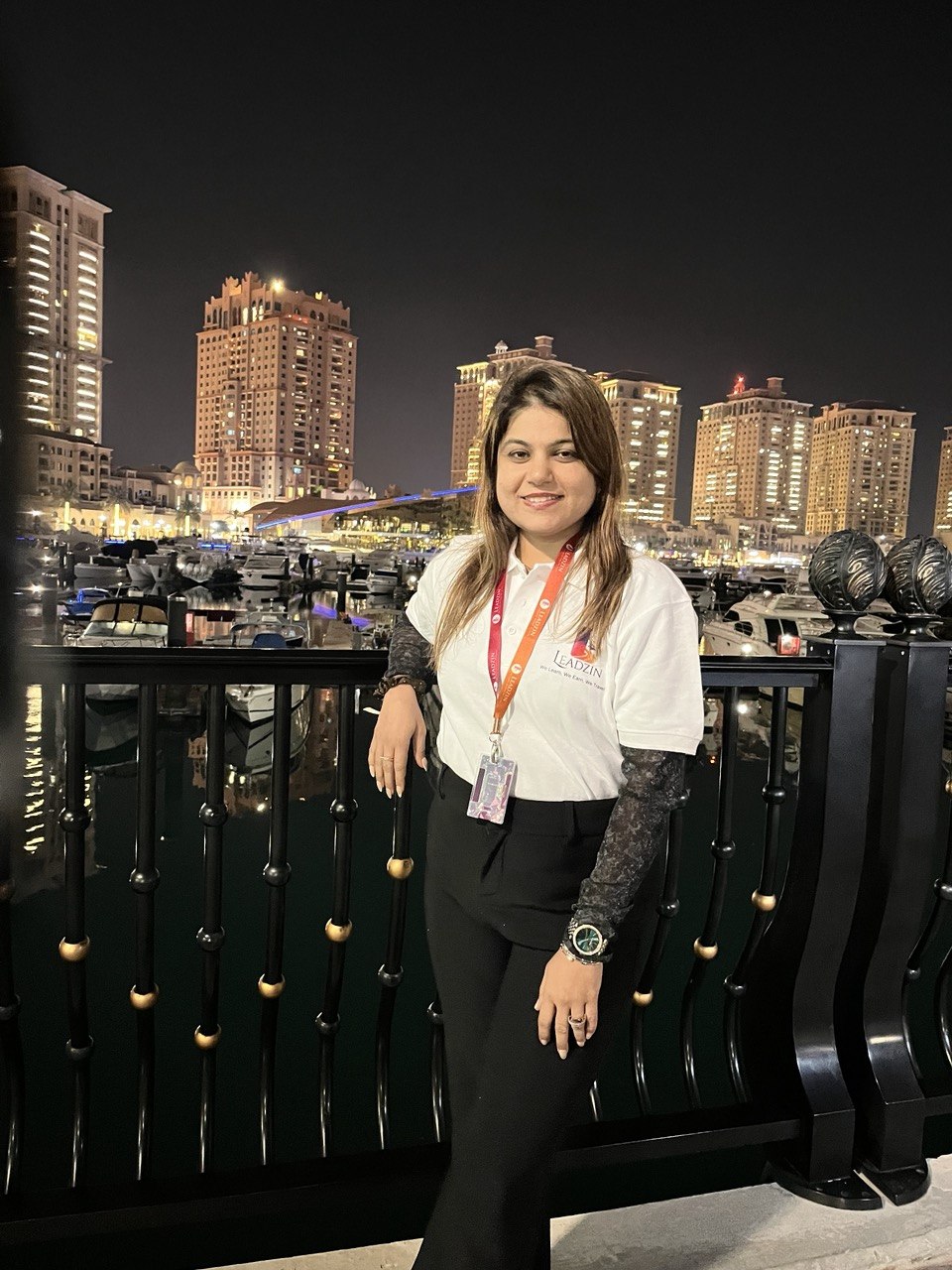 Neelam at a waterfront marina at night